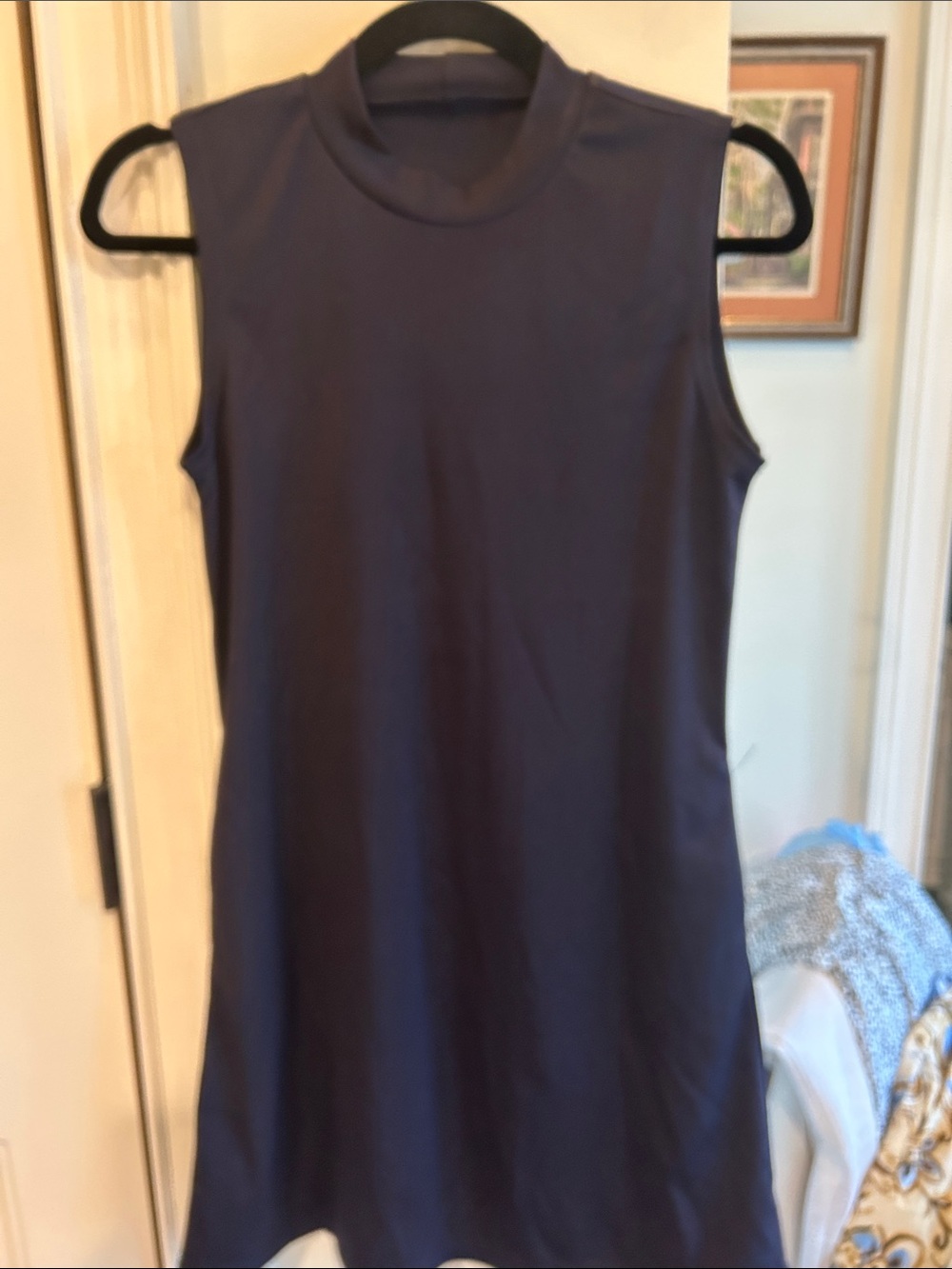 Sleeveless Mock Neck A-Line Top - Navy with pockets.